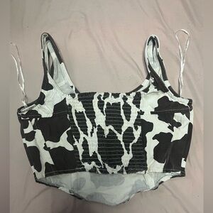 “Lone Star” Size Medium brown cow print crop top. denim like texture